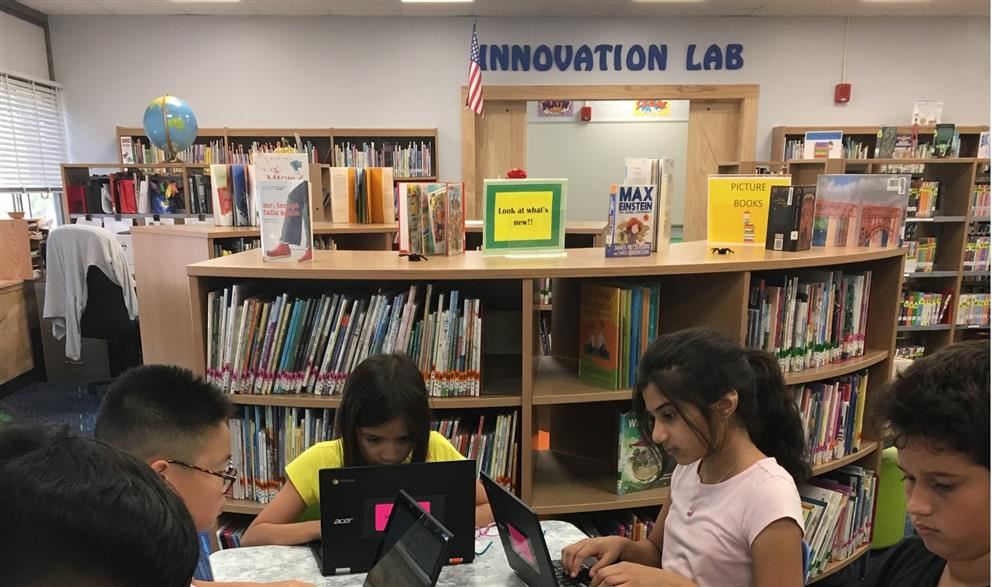 Students working with chromebooks